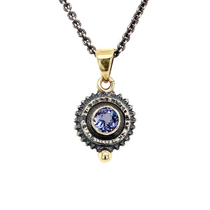 “She’s Getting Into High Gear” - Tanzanite 14K Gold & Silver Pendant